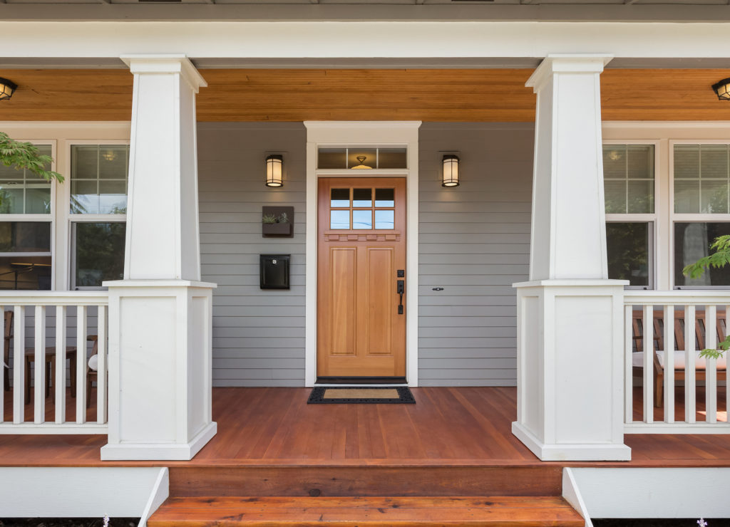 Front Door with covered porch and front door of beautiful new home