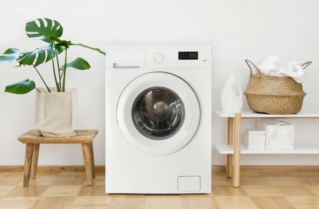 Clothes washing machine in laundry room interior